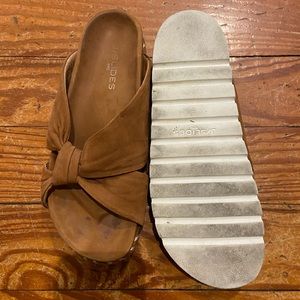 J slides gently worn sandals